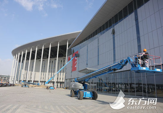 国家会展中心19日迎首展 建设慰问演出启动