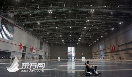 国家会展中心19日迎首展 建设慰问演出启动