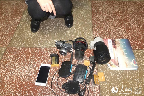 得知昆明举办旅交会 女子从杭州飞到会展中心偷相机和镜头